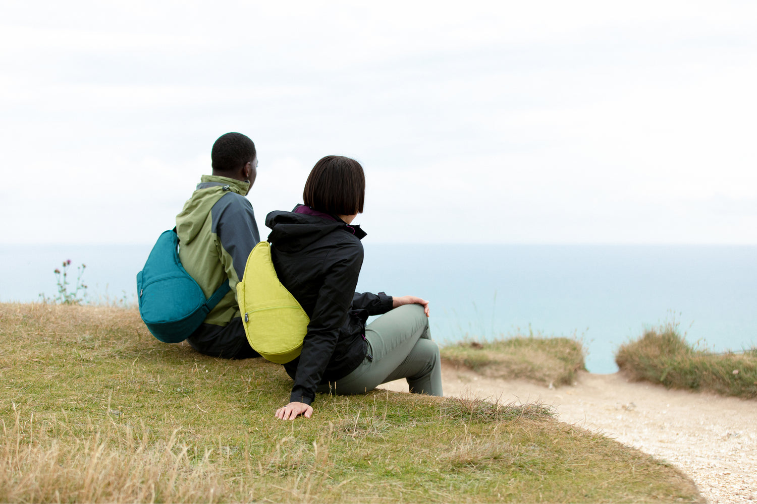 man & woman wearing healthy back bags